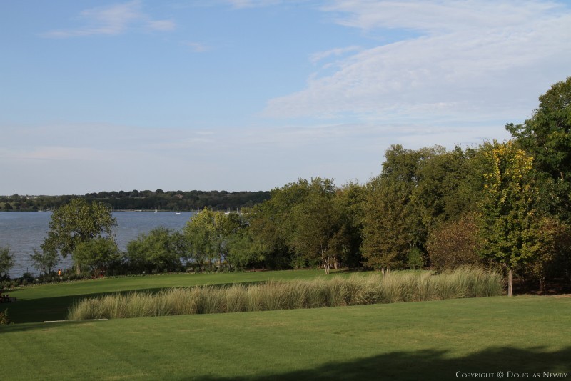 Some extraordinary homes are designed on small lots with great views, others are designed on the rare four-acre lots in Dallas as this one is, capturing 270° views of White Rock Lake.