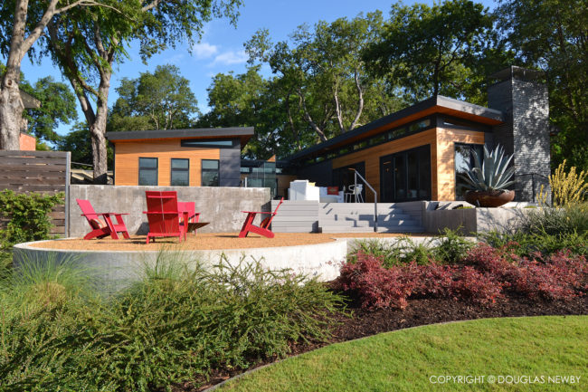 The style of this home by Seattle architect Ryan Grey Smith, across from White Rock Lake in Dallas, will be familiar to those at Amazon HQ2. 