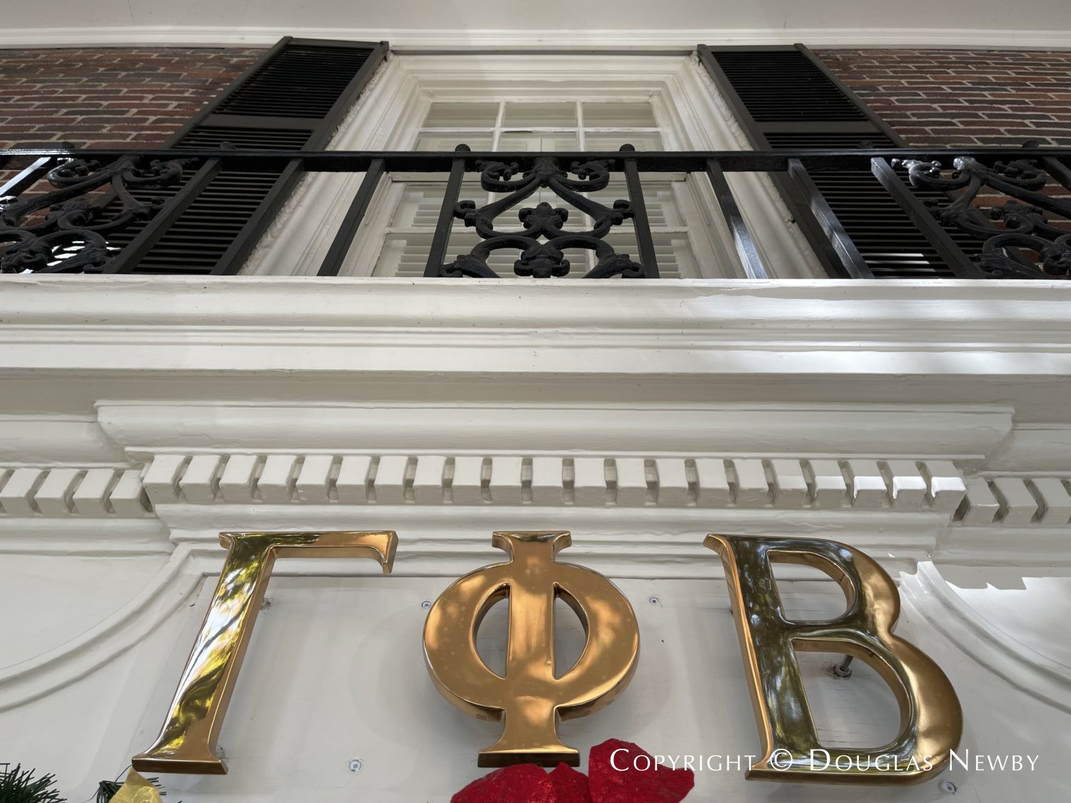 home of Sorority Gamma Phi Beta identified by Greek letters.