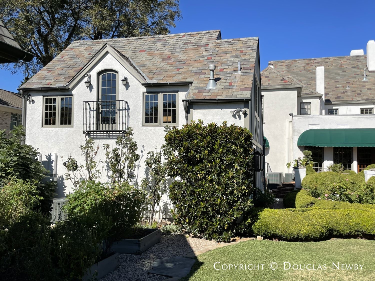 Lang & Witchell designed this architecturally significant home at 5112 Swiss.