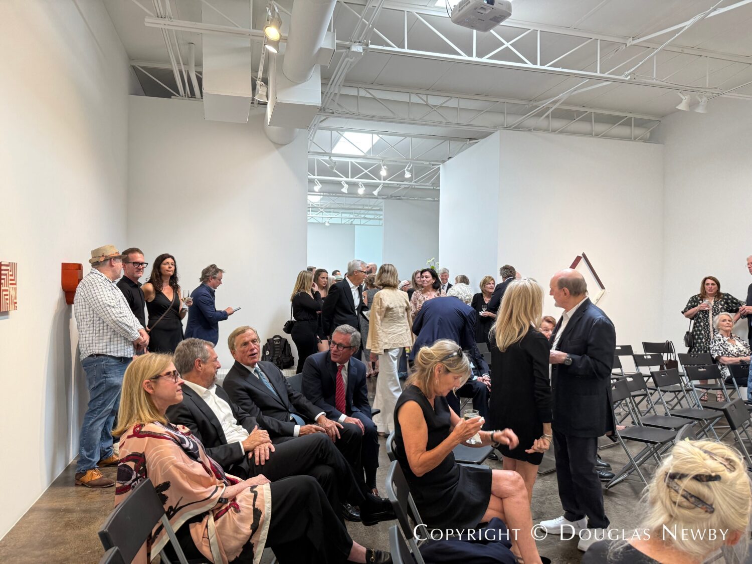 Susie Priori Bauer is seen at the Celebration of Life for John Reoch held at the Conduit Gallery in Dallas.